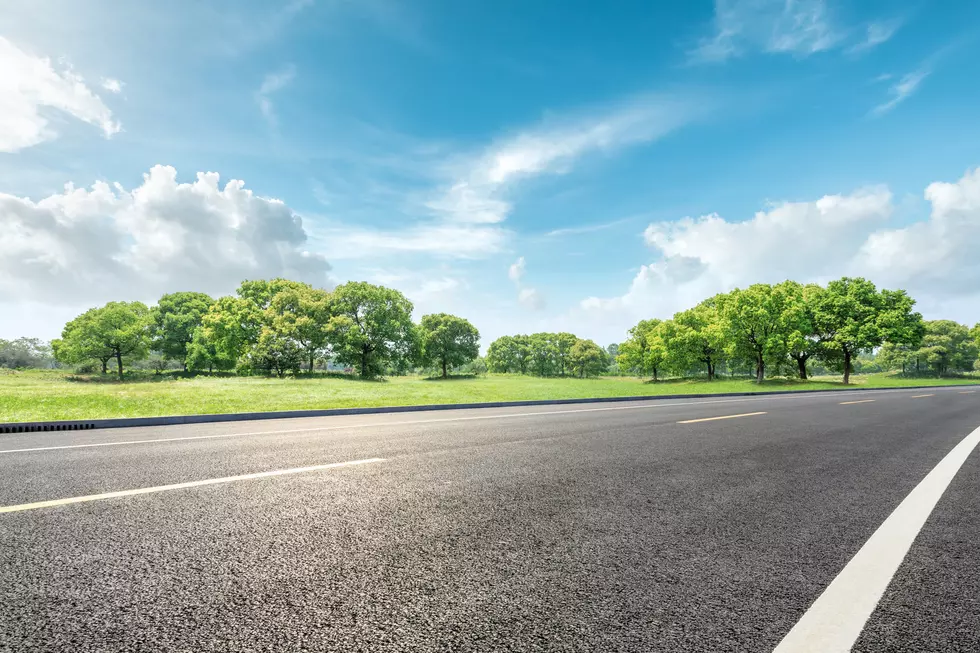 Hero Saves Child Walking in Middle of CNY Road While Cars Swerve Around